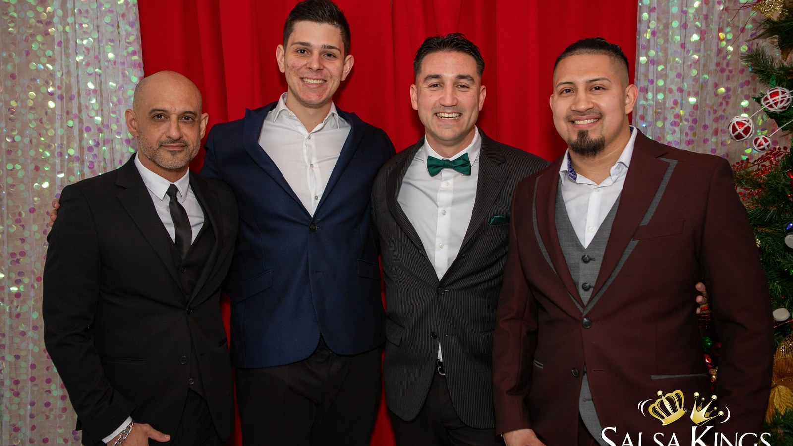 Salsa Kings Latin dance instructors and performers in formal dance attire