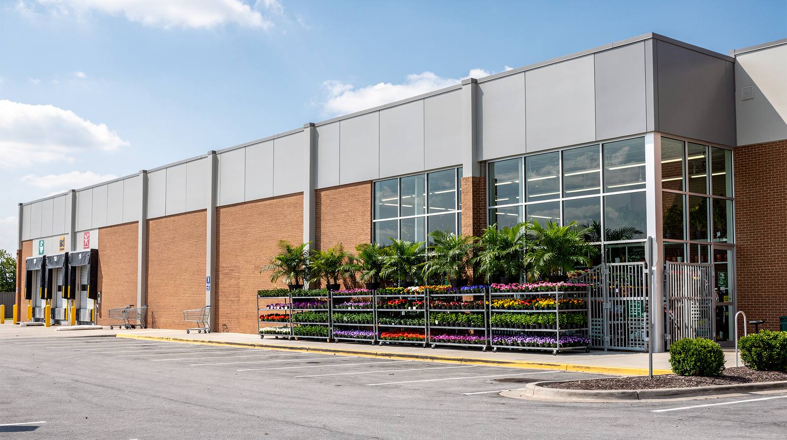 Big-box home improvement store exterior showing the garden center plant entrance