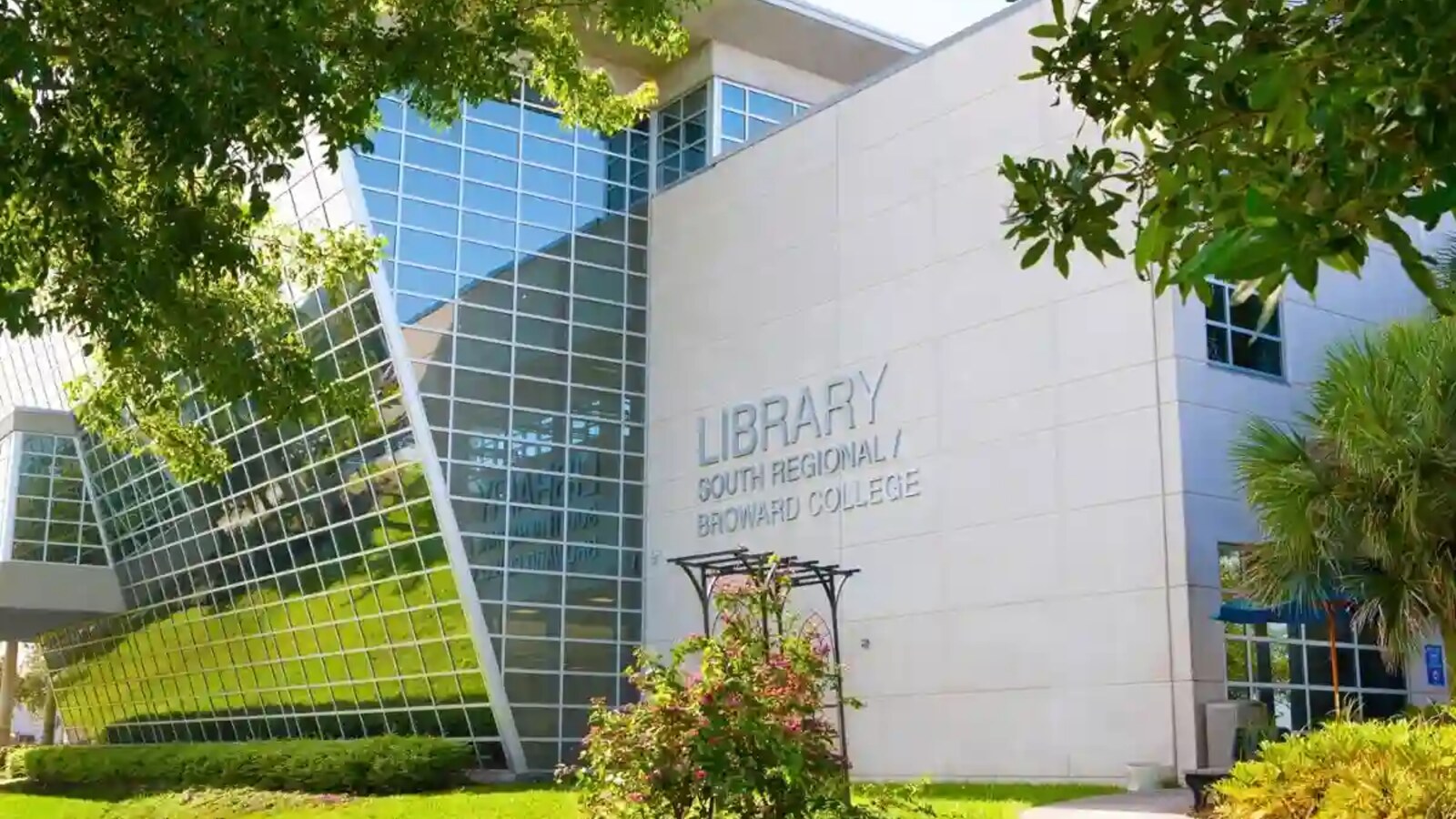 South Regional / Broward College Library — official exterior with glass facade and "LIBRARY / SOUTH REGIONAL / BROWARD COLLEGE" signage