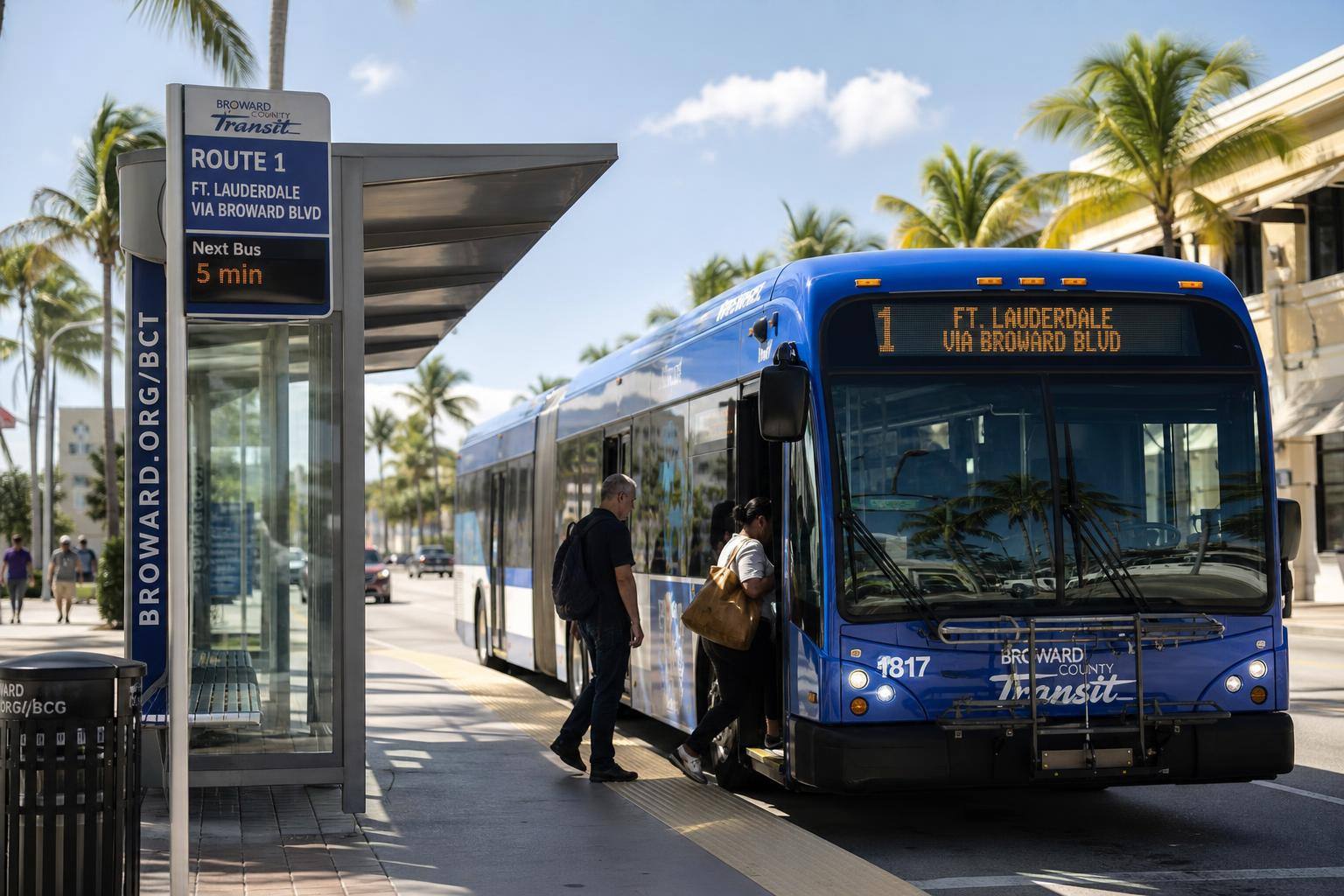 Representative modern city bus at an urban transit stop during daytime with clear sky