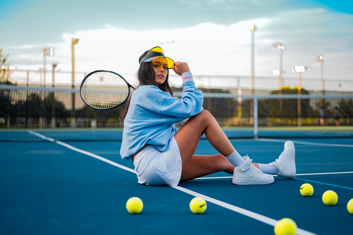 Outdoor tennis courts at Towngate Tennis Center in Pembroke Pines with lighted courts and clear blue sky