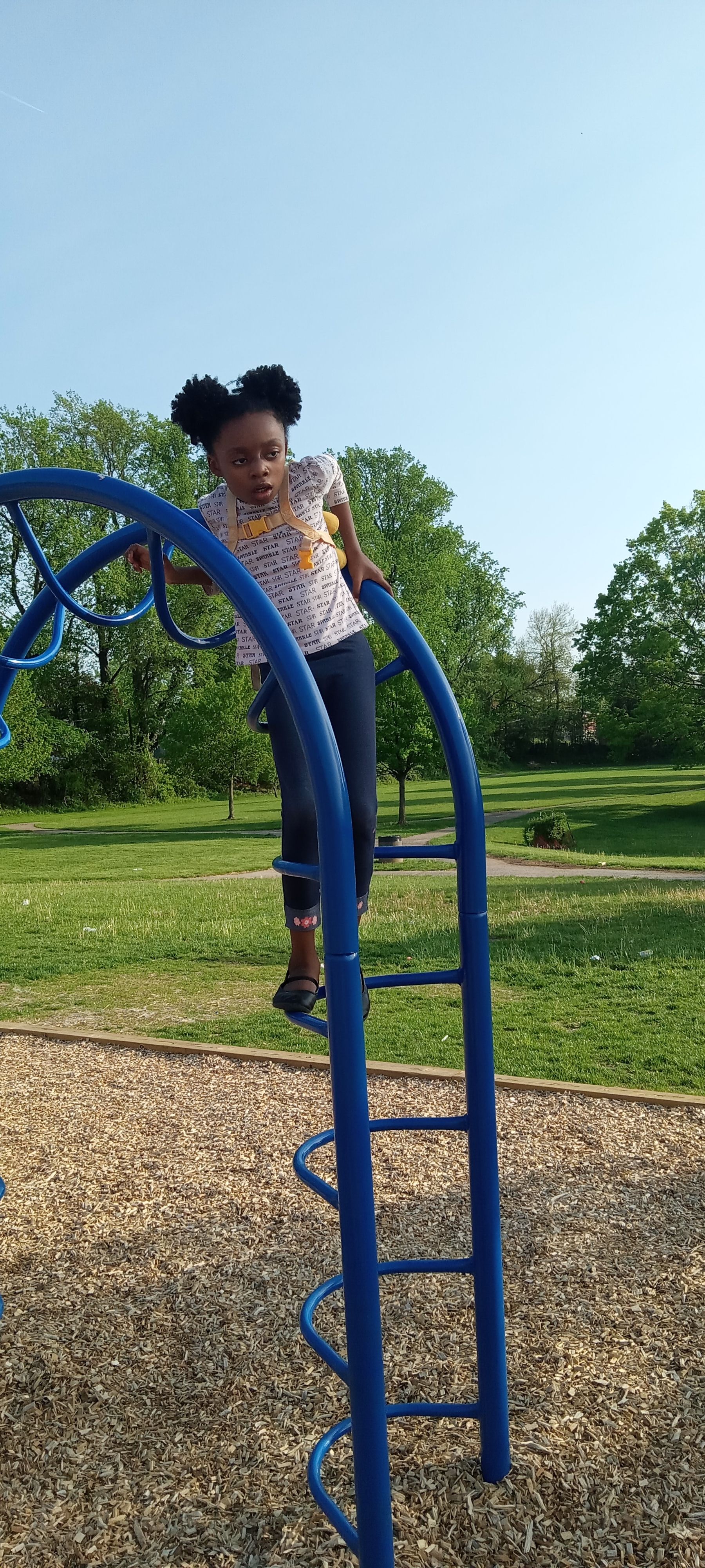 Representative Pexels stock photo, not a local venue: child climbing a playground ladder.